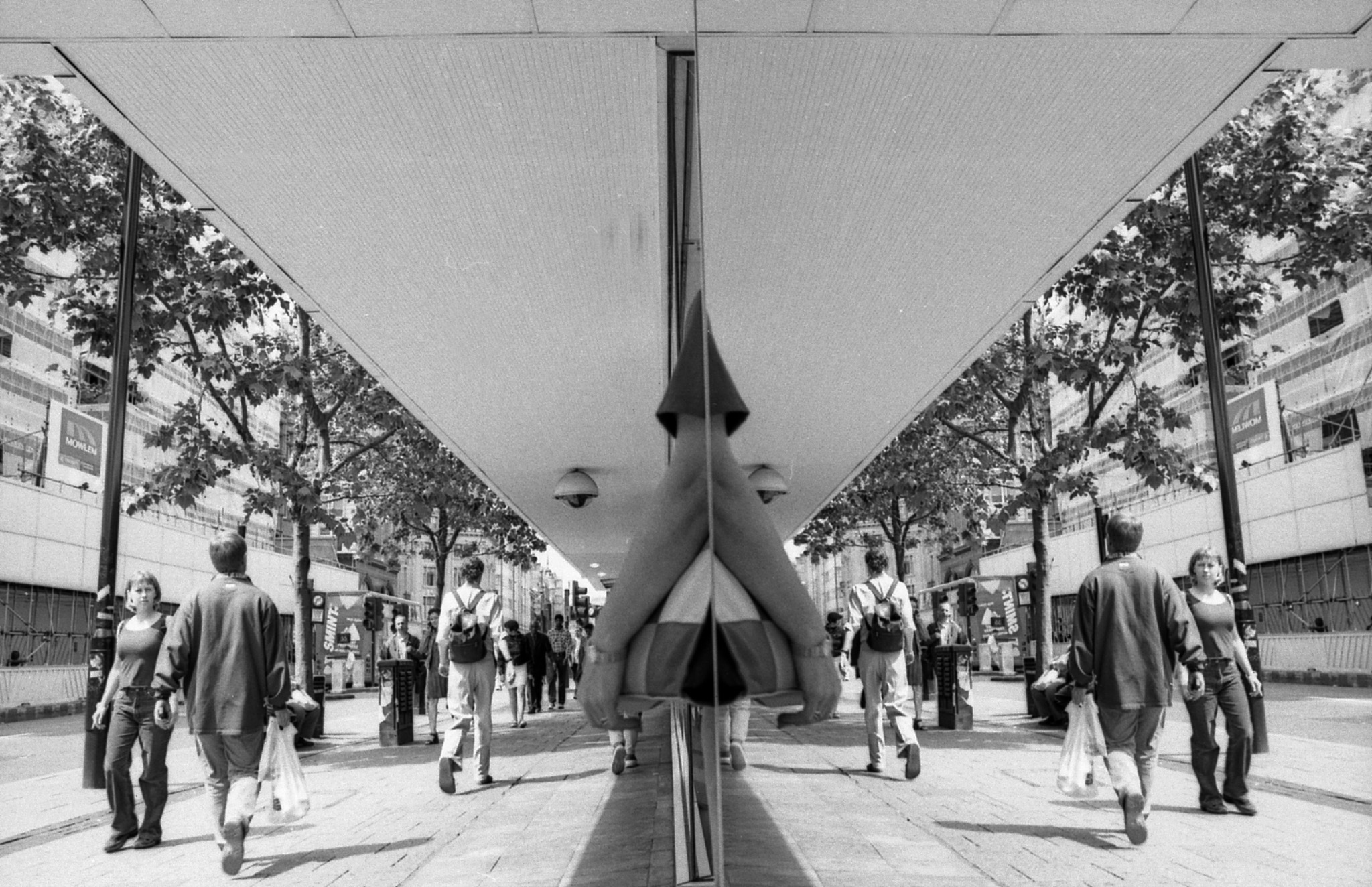 Mirrored city pedestrians